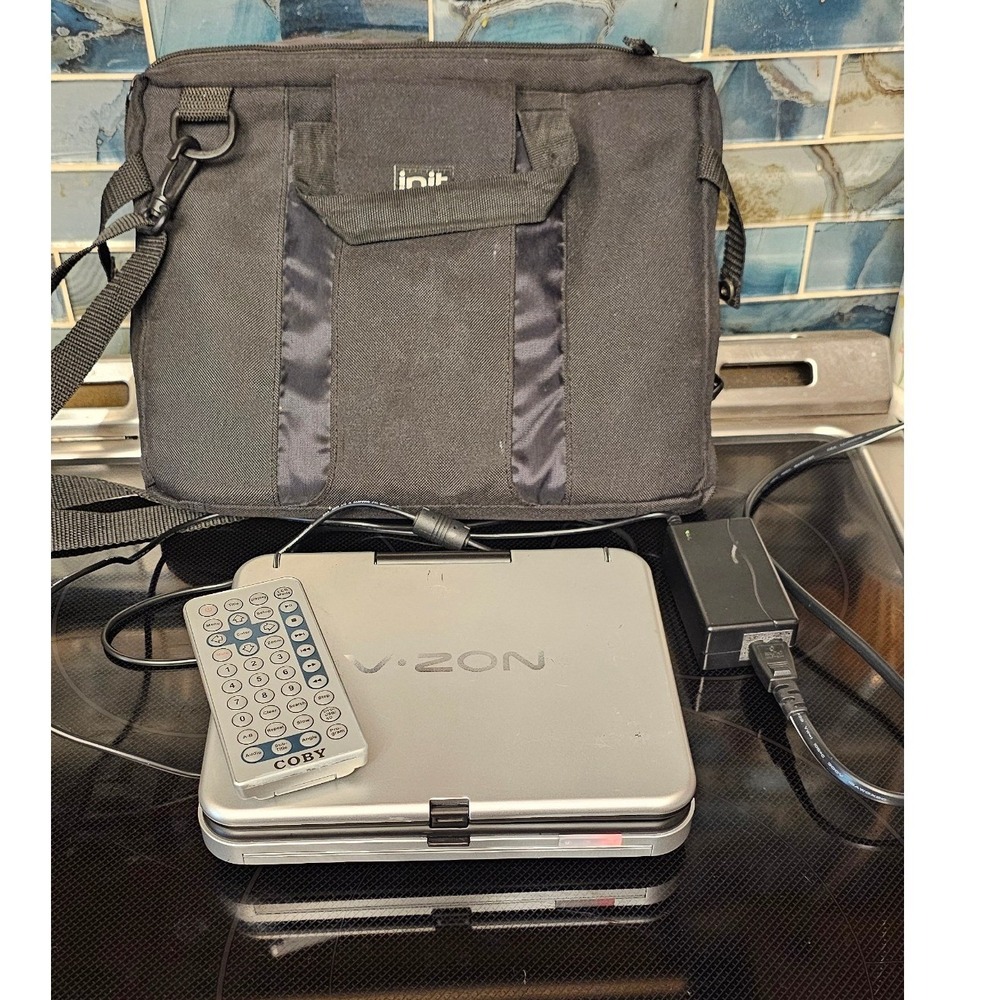 Coby V-Zon Portable DVD Player Silver MP3 DivX SD Card Slot with Remote and Bag